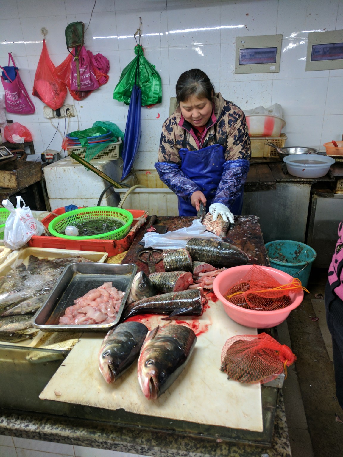 Fish being prepared at a market